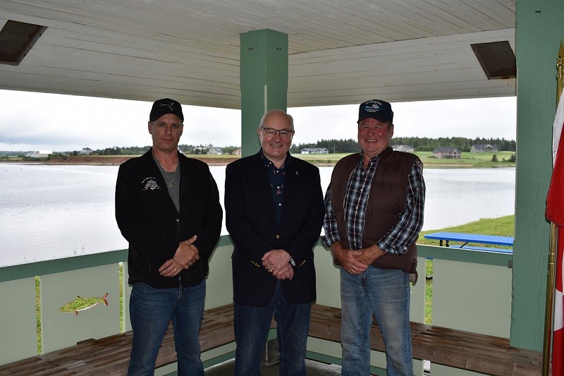 MP  Easter poses for a photo with harbour authority representatives following the announcement. He is flanked by John Peters (left) from North Rustico Harbour Authority and right, Alan Cody from the Covehead Harbour Authority.