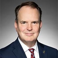 Headshot of Steven MacKinnon