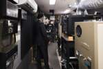 Tab 3: Minister Sajjan tours the projection room at Vancouver International Film Festival.